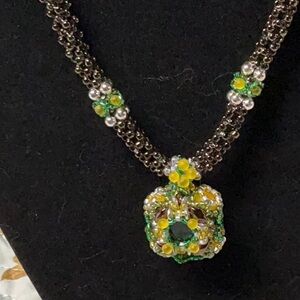 Elegant Floral Necklace with Yellow and Green Accents